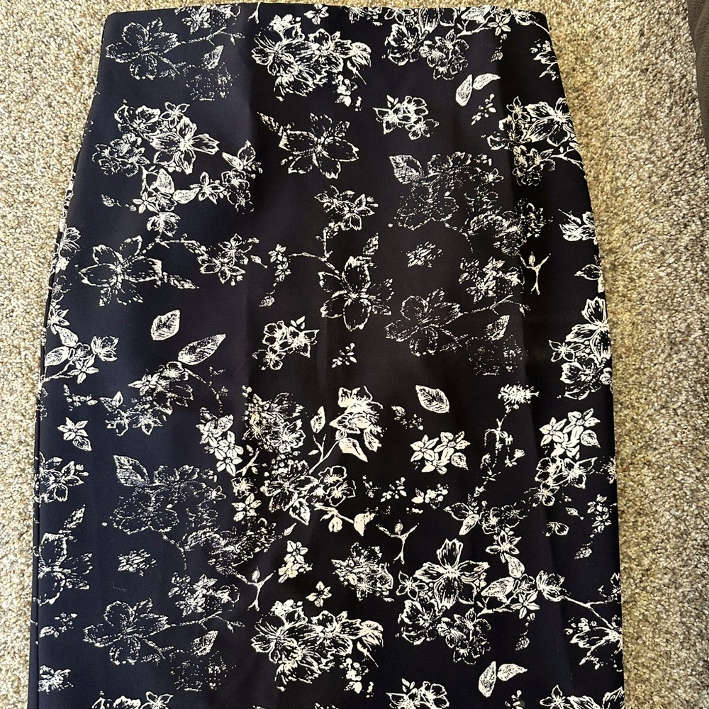 At the knee skirt.